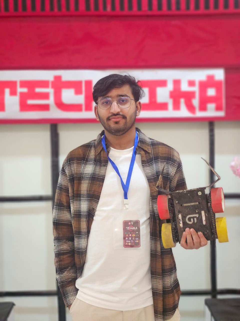 Shashank Dev at Technica, holding a robotics project